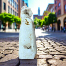 This Druzy Quartz Tower is a must-have for crystal collectors and energy workers. The natural formation of druzy crystals gives this tower a unique, glittering appearance that is said to promote balance, harmony, and positive energy. Made with high-quality, genuine druzy quartz, this tower is a powerful addition to any crystal collection.