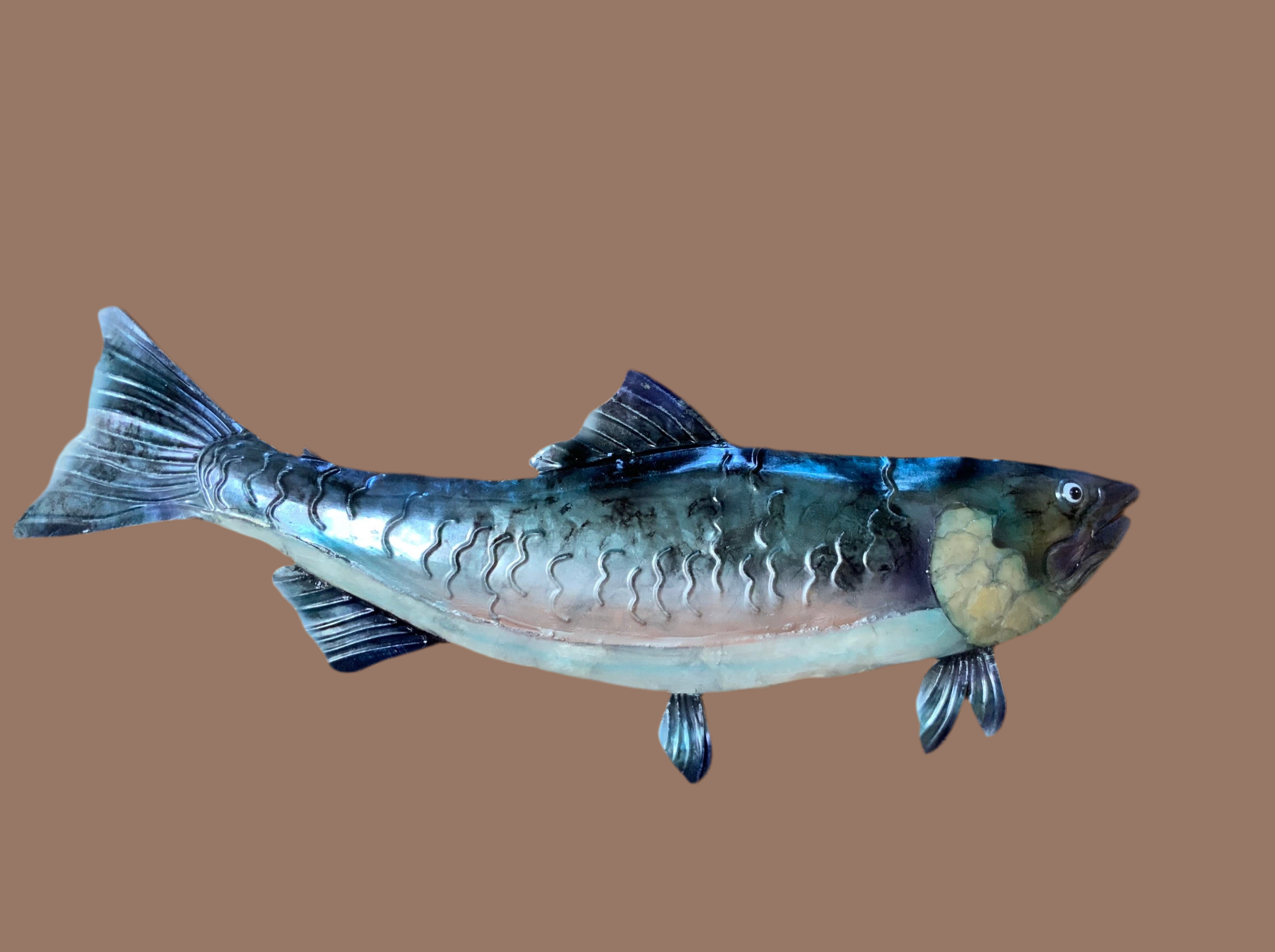 Blue and White Capiz Shell Decor.  This piece is mad from Aluminum 18 inches Long.  This will look great with any home Decor 
Add an elegant touch to your home decor with the Blue and White Capiz Wall Decor Rainbow Trout. Made from high-quality Aluminum, this 18-inch long piece will effortlessly blend in with any interior design. Bring a touch of nature into your space with this stunning and durable wall decor.