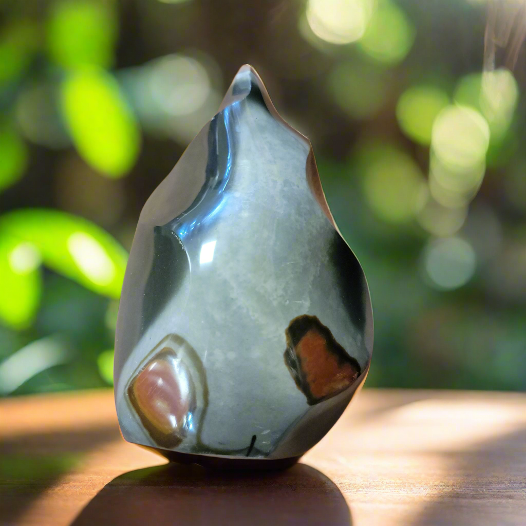 The Desert Jasper Flame is a large, flame-shaped crystal made of Jasper. With its natural beauty and unique shape, it makes a stunning addition to any crystal collection. Jasper is believed to promote tranquility and stability, making this crystal not only beautiful but potentially beneficial for the user.