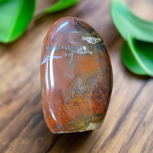 This Desert Jasper Freeform is a stunning example of the unique and diverse beauty of the natural world. With its intricate patterns and warm tones, it is a one-of-a-kind piece that will add a touch of natural elegance to any space. Its healing powers and grounding energy make it an ideal addition to any crystal collection.
