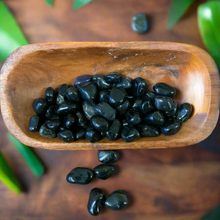 This Black Onyx Tumbled stone is not only beautiful, but also has powerful healing properties. Its smooth, polished surface invites a sense of calm and grounding, making it a perfect addition to any mindfulness or meditation practice. Harness its energy to promote strength, protection, and deep inner reflection.