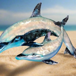 Experience the beauty of the ocean from your own home with our Blue Capiz Dolphins Wall Art & Decor. This 17 inch metal art piece features stunning Capiz shell inlay, creating a unique and eye-catching display for any wall. Add a touch of undersea elegance to any room with this one-of-a-kind piece.
