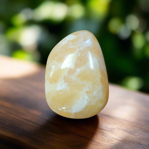 This Large Orange Calcite Tumbled Stone boasts powerful healing properties. With its vibrant color and smooth texture, it's a must-have for crystal collectors and spiritual enthusiasts alike. With its ability to amplify energy and promote emotional balance, this tumbled stone is the perfect addition to any collection.