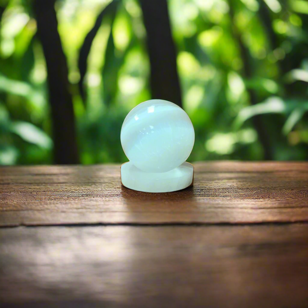 Enhance your healing and energy with our 3” Selenite Sphere, sold with a stand for optimal. Selenite amplifies your intentions and promotes clarity, focusing your energy for powerfuL healing benefits. Experience its soothing and calming effects on the mind, body, and soul.