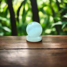 Enhance your healing and energy with our 3” Selenite Sphere, sold with a stand for optimal. Selenite amplifies your intentions and promotes clarity, focusing your energy for powerfuL healing benefits. Experience its soothing and calming effects on the mind, body, and soul.
