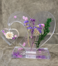 This handcrafted Resin Heart measures 7 inches tall and 8 inches wide, making it a beautiful and substantial addition to any space. Its unique design and expert craftsmanship are sure to impress. Perfect for adding a touch of elegance and charm to your home or office.