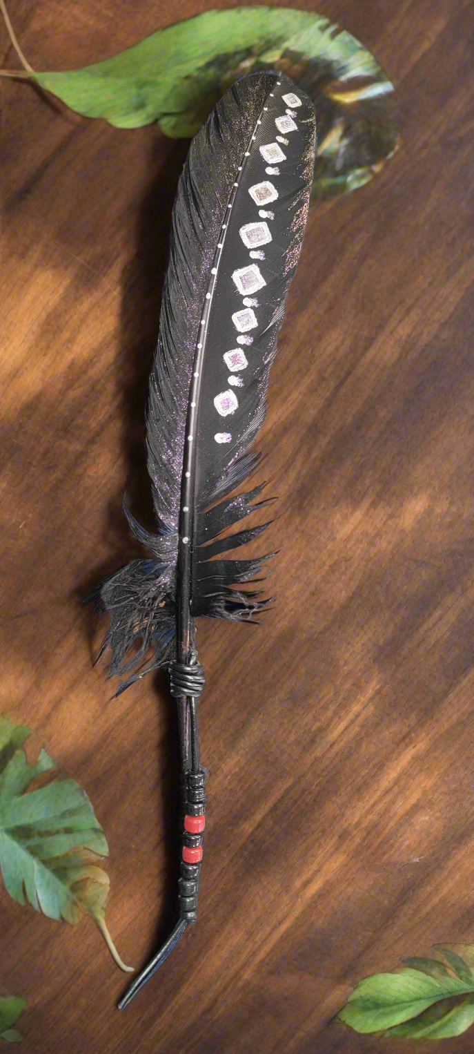 Expertly crafted by artist Cathy Saxton, these distinctive hand painted feathers are a one-of-a-kind addition to any collection. Each piece is uniquely designed and painted, making it a beautiful and artistic statement piece for any home or office. Bring a touch of nature and creativity to your space with these stunning hand painted feathers.