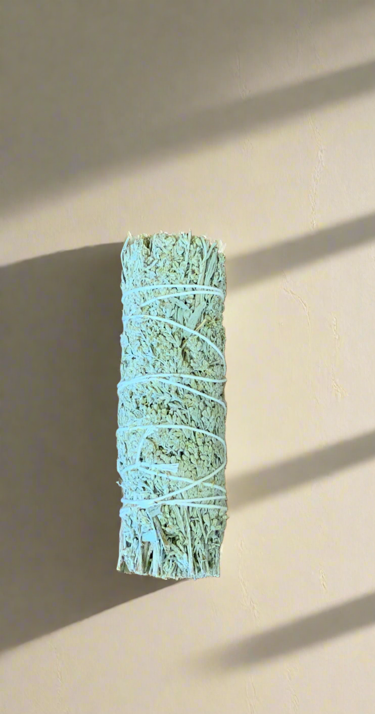 The Blue Sage Smudging Stick is a powerful spiritual tool for cleansing and purifying one's space. At 4 inches in length, its blue sage composition provides a natural, aromatic scent that is believed to clear negative energy and promote positive vibes. Trust in its traditional use for a more serene and harmonious environment.smudging 