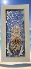 Experience the beauty of the ocean with our Turtle of the Sea Resin Picture. Each piece is uniquely handmade, capturing the intricate details of our beloved sea turtles. Made with resin art and framed to perfection, this 5 by 11 inch picture is a must-have for any marine enthusiast.