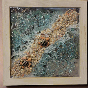 Introduce beautiful sea turtles into your home decor with this handmade resin picture by Shirley Blade. Measuring 12 by 12 inches, this unique piece adds a touch of nature to any space. Experience the calming presence of these mesmerizing creatures with this one-of-a-kind artwork.