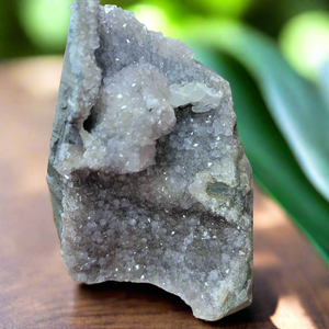 The Amethyst Speciman is a stunning addition to any collection. Its naturally freeform shape showcases the unique beauty of amethyst, making it a one-of-a-kind piece. With its captivating appearance and alluring purple hue, this specimen is sure to be a standout in any setting.Amythest Speciman