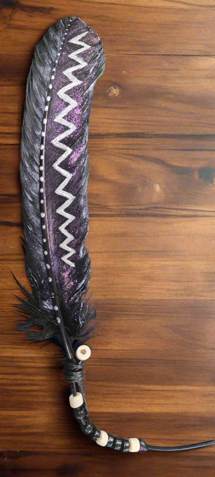 Expertly crafted by artist Cathy Saxton, these distinctive hand painted feathers are a one-of-a-kind addition to any collection. Each piece is uniquely designed and painted, making it a beautiful and artistic statement piece for any home or office. Bring a touch of nature and creativity to your space with these stunning hand painted feathers.