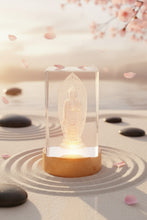 Glass Buddha on light pedestal meditation