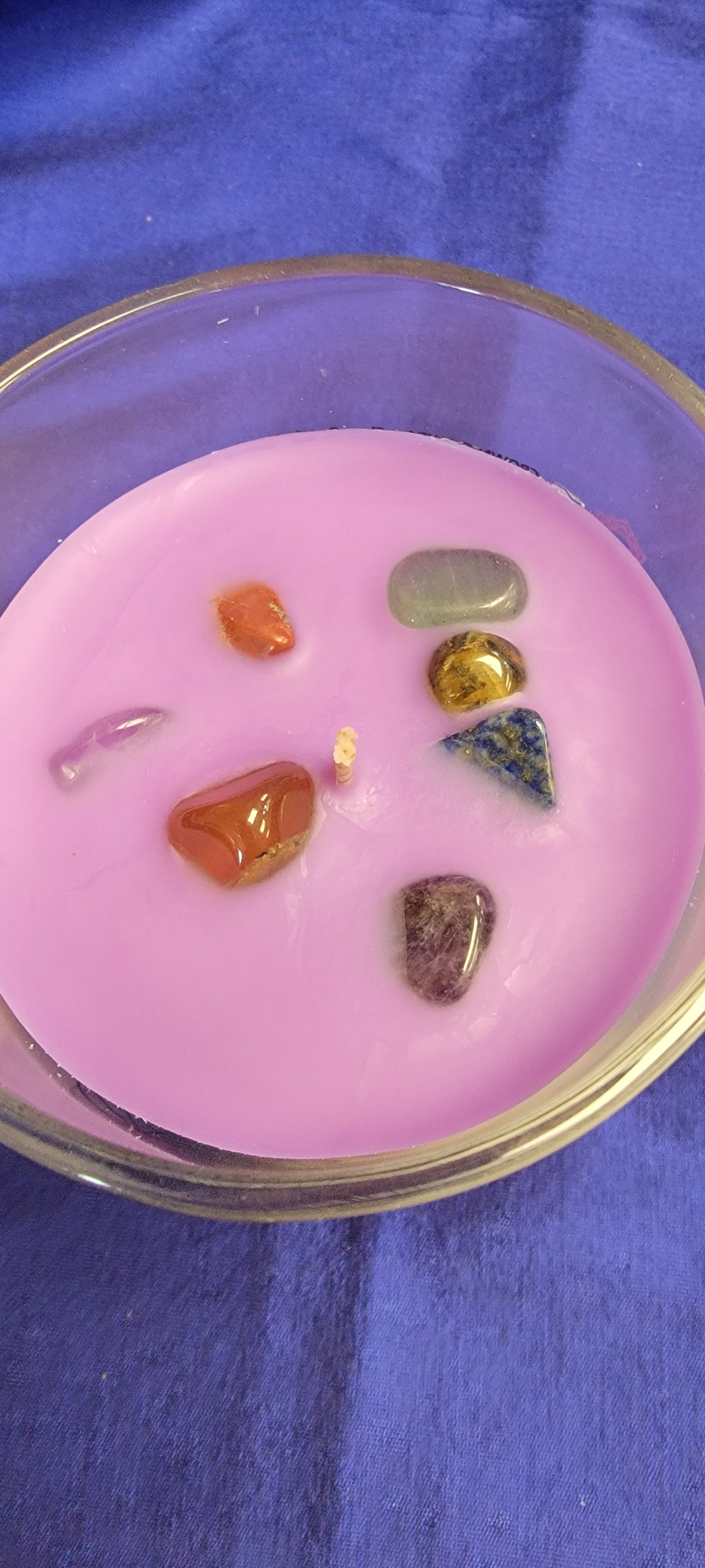 Enhance your meditation practice with our Chakra Crystal Candle. Each candle is carefully crafted with gemstones representing the chakras, promoting balance and alignment within the body. Connect with your inner calm and unlock the power of these ancient energy centers.