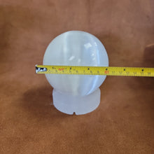 Selenite Sphere with selenite stamd
