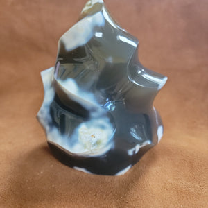 This exquisite Chalcedony Flame, weighing 1.26 KG, is a stunning addition to any collection. With its unique and beautiful features, it is sure to capture attention and add a touch of elegance to any space. Crafted with precision and expertly designed, it is a must-have for any product or crystal enthusiast.