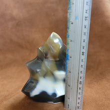 This exquisite Chalcedony Flame, weighing 1.26 KG, is a stunning addition to any collection. With its unique and beautiful features, it is sure to capture attention and add a touch of elegance to any space. Crafted with precision and expertly designed, it is a must-have for any product or crystal enthusiast.
