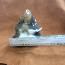 This exquisite Chalcedony Flame, weighing 1.26 KG, is a stunning addition to any collection. With its unique and beautiful features, it is sure to capture attention and add a touch of elegance to any space. Crafted with precision and expertly designed, it is a must-have for any product or crystal enthusiast.