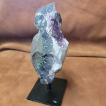 Experience the natural beauty and positive energy of our Amethyst Speciman with metal base. This carefully selected crystal is delicately pinned for home decor, bringing a touch of elegance and grounding energy to any space. Embrace the benefits of Amethyst, known for its calming and healing properties.