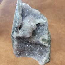 The Amethyst Speciman is a stunning addition to any collection. Its naturally freeform shape showcases the unique beauty of amethyst, making it a one-of-a-kind piece. With its captivating appearance and alluring purple hue, this specimen is sure to be a standout in any setting.Amythest Speciman