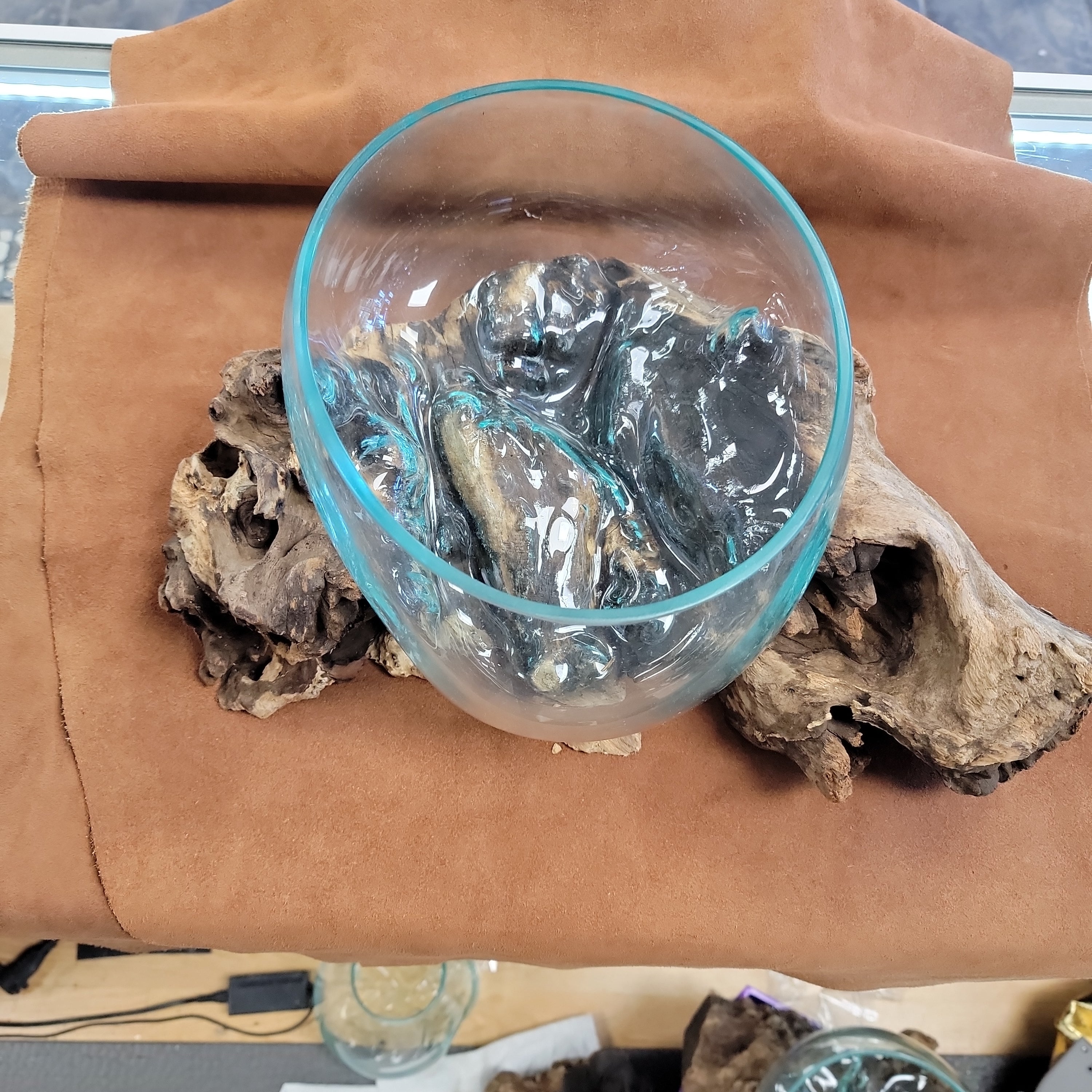 Handblown glass molted on teakwood Root