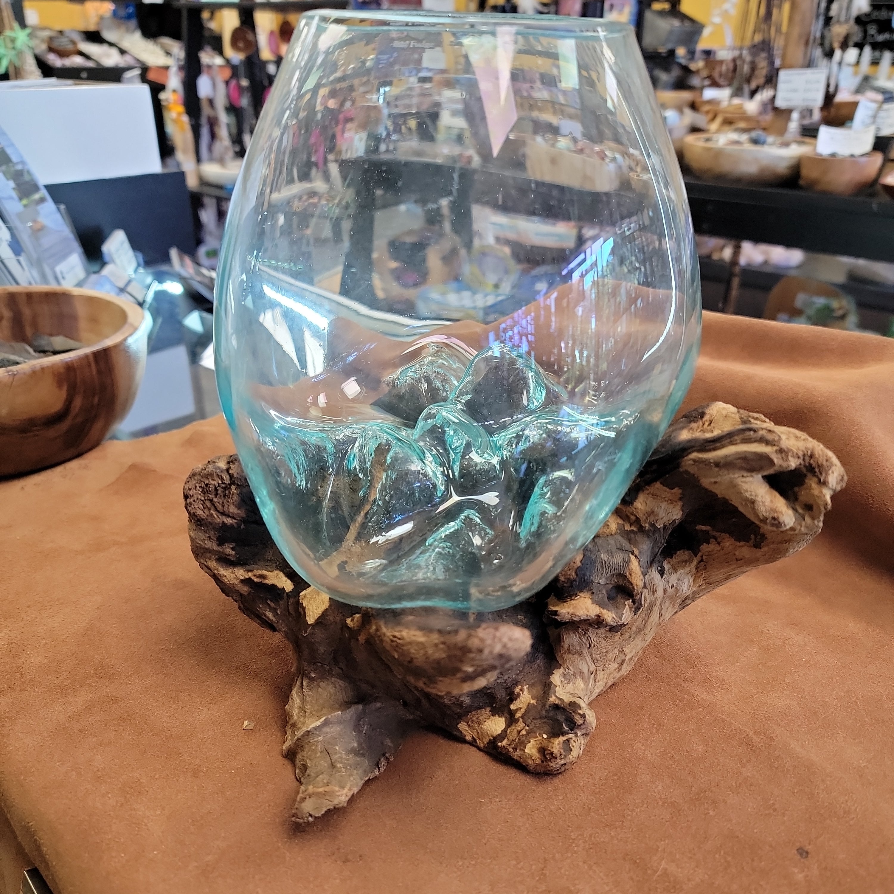 Handblown glass molted on teakwood Root