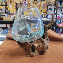 Handblown glass molted on teakwood Root