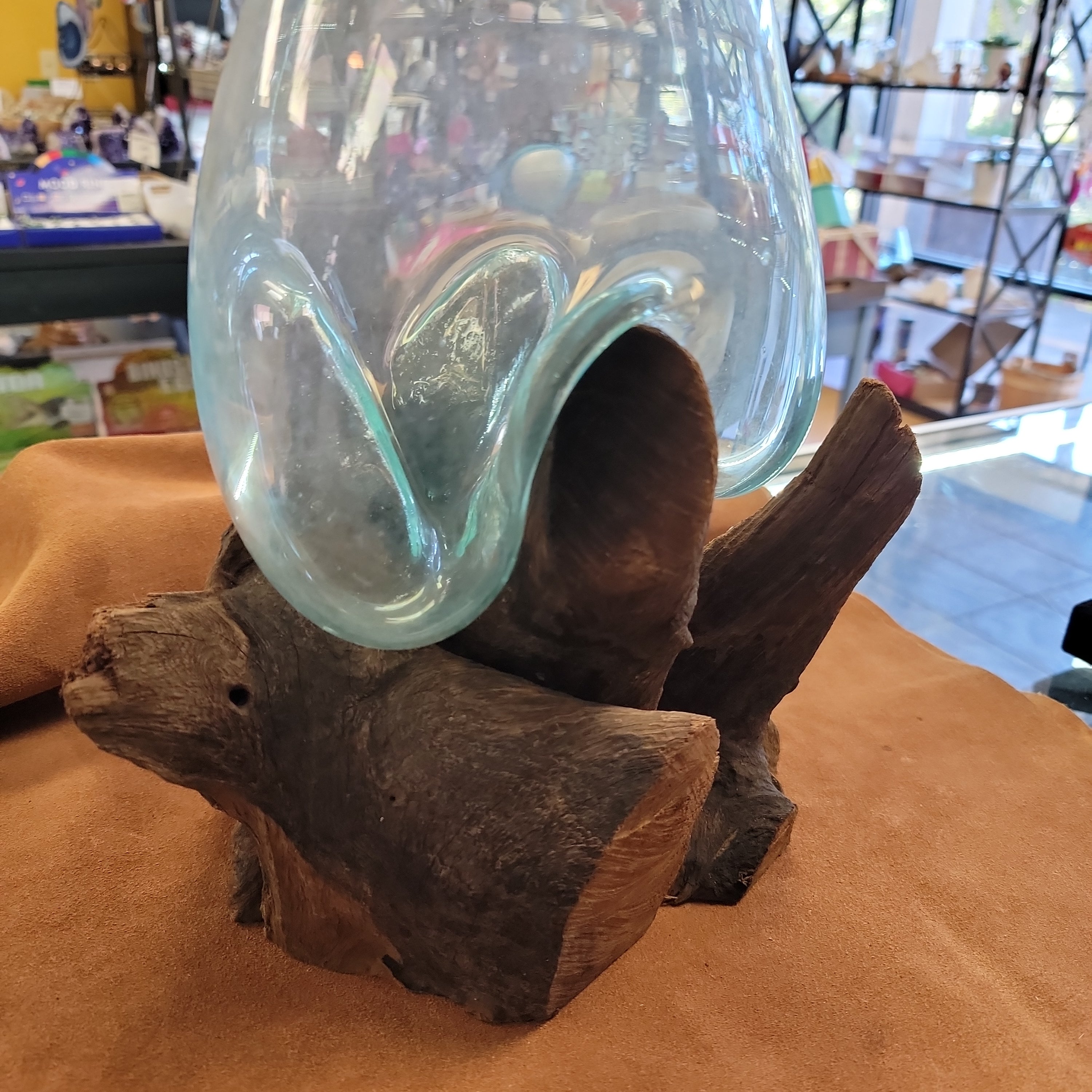 Handblown glass molted on teakwood Root