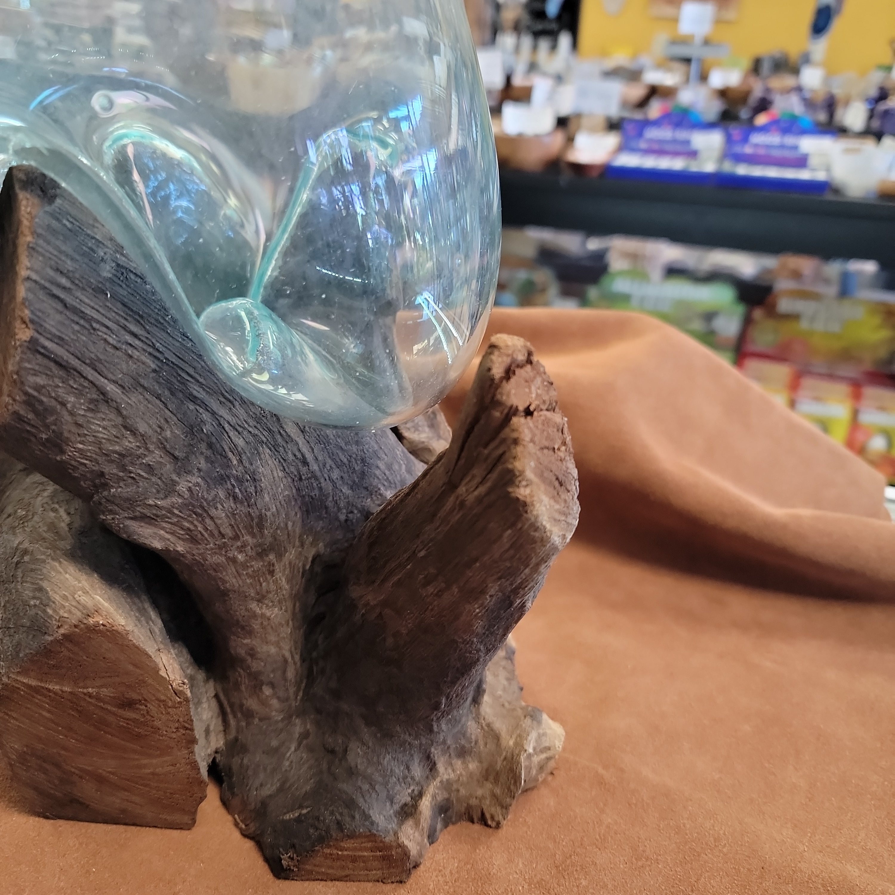 Handblown glass molted on teakwood Root