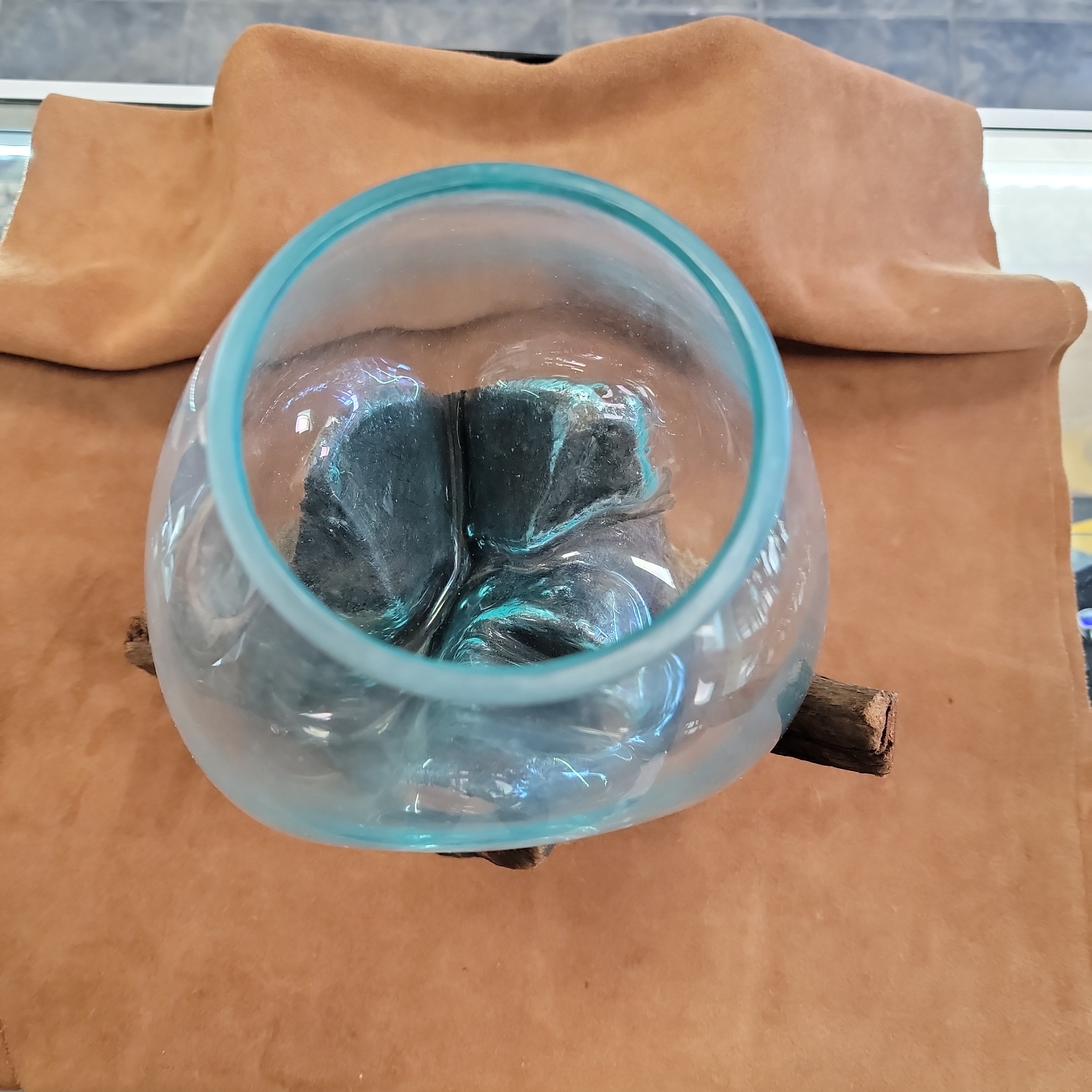 Handblown glass molted on teakwood Root