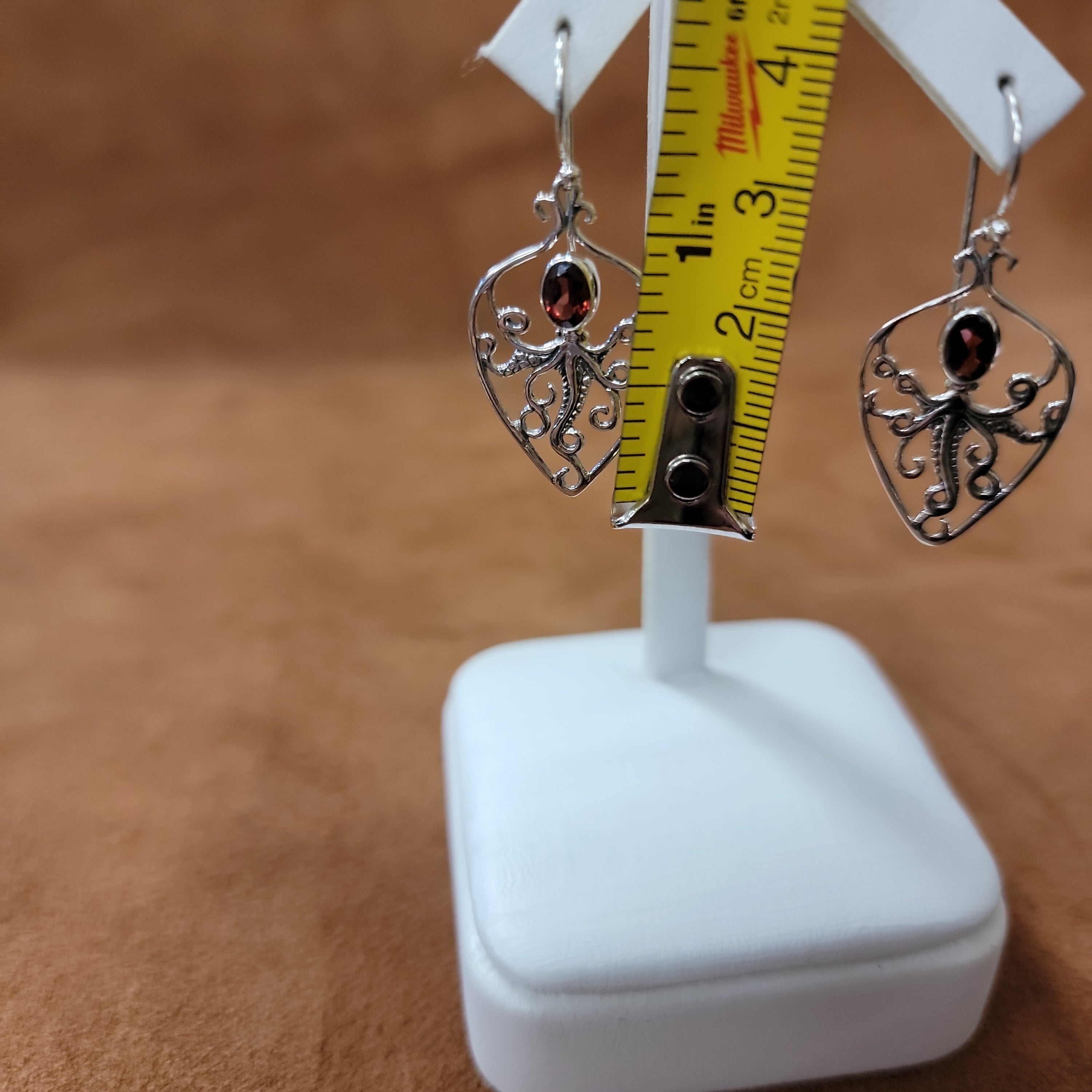 Vera Wolf Sterling Silver Earrings Octopus with Ruby Colored Stone