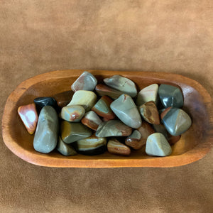 Introducing Desert Jasper tumbled stones, an essential addition to any crystal collection. These stones are expertly sourced and tumbled to reveal their unique patterns and soothing energy. Perfect for grounding and promoting tranquility, these stones are a must-have for meditation and relaxation.