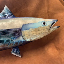 Colorful Decor.  This piece is made from Metal 31 inches Long. This will look great with any home Decor. Transform your home into a work of art with our stunning Blue and White Capiz Wall Art Tuna. Made with high-quality metal, this 31-inch long piece adds a pop of color and a touch of elegance to any home decor. The perfect addition to enhance the aesthetic appeal of your living space. Boost your home's style and leave a lasting impression on your guests.