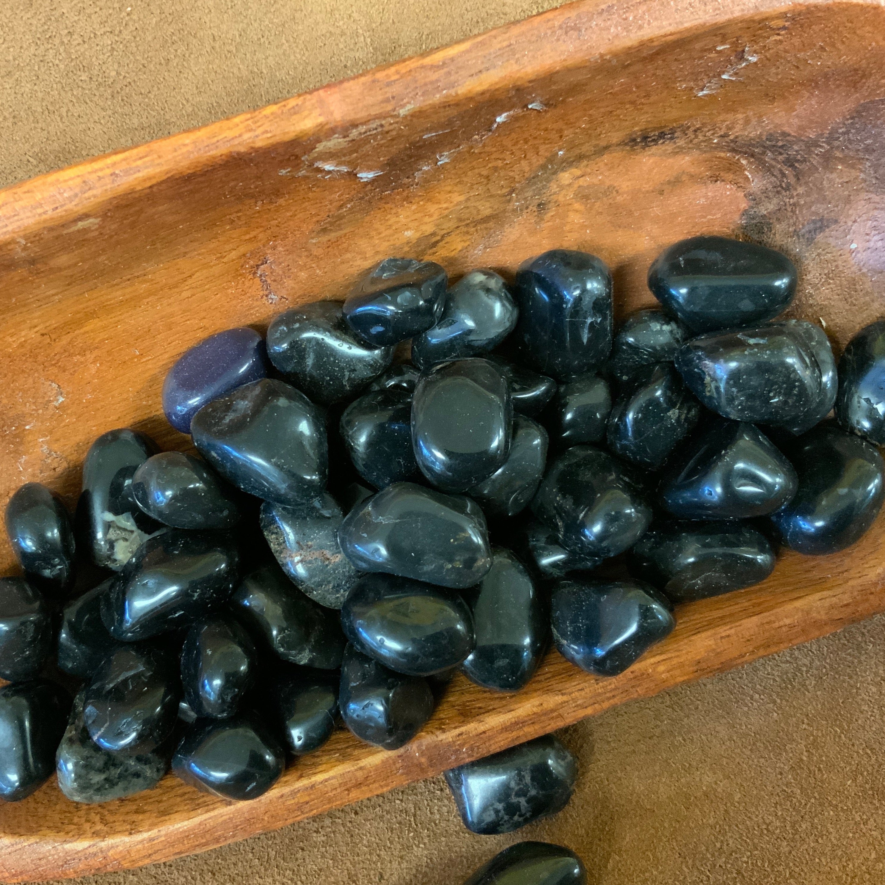 This Black Onyx Tumbled stone is not only beautiful, but also has powerful healing properties. Its smooth, polished surface invites a sense of calm and grounding, making it a perfect addition to any mindfulness or meditation practice. Harness its energy to promote strength, protection, and deep inner reflection.