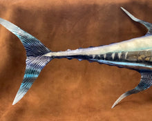 Colorful Decor.  This piece is made from Metal 31 inches Long. This will look great with any home Decor. Transform your home into a work of art with our stunning Blue and White Capiz Wall Art Tuna. Made with high-quality metal, this 31-inch long piece adds a pop of color and a touch of elegance to any home decor. The perfect addition to enhance the aesthetic appeal of your living space. Boost your home's style and leave a lasting impression on your guests.